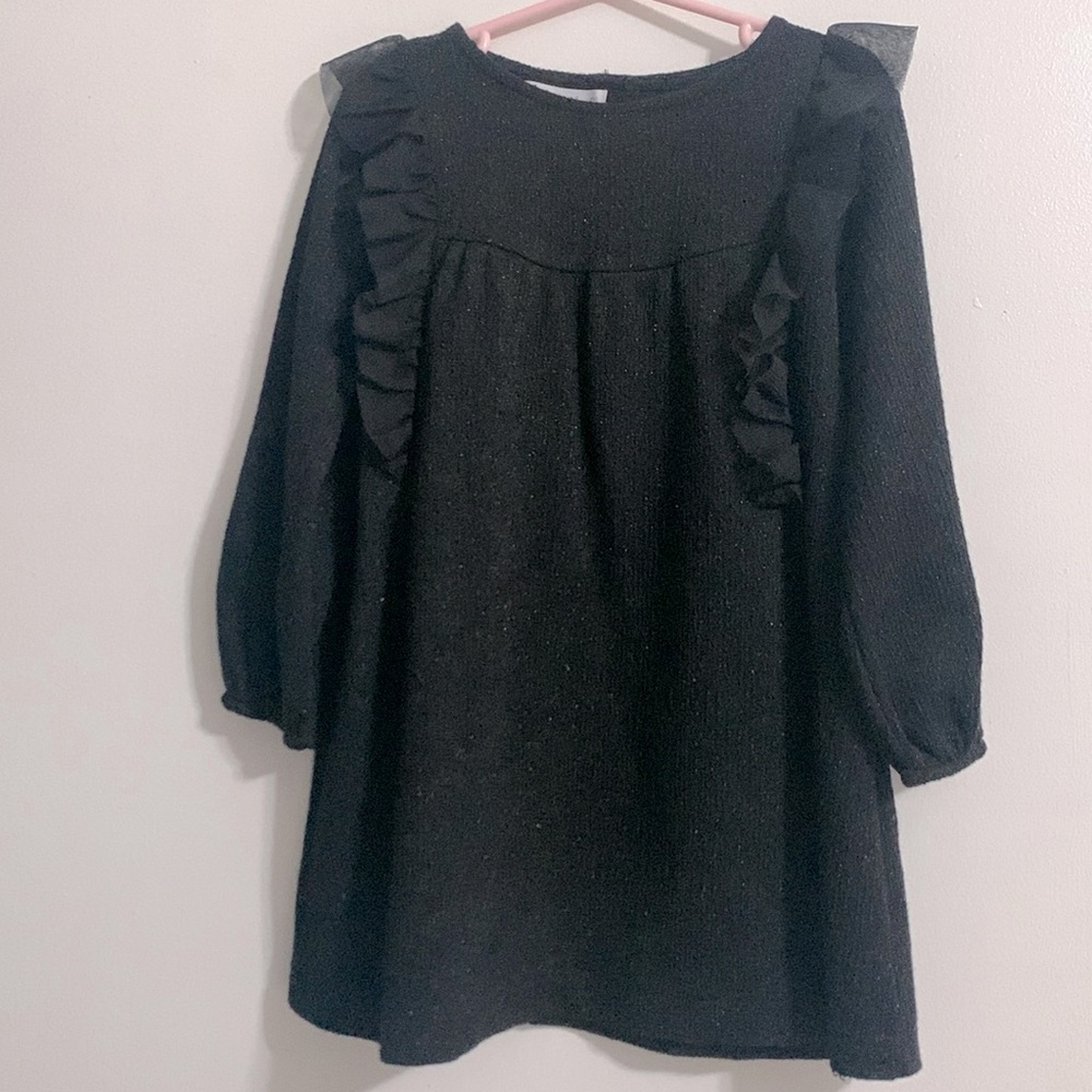 Sparkly black dress. Was never used, but tags were removed.